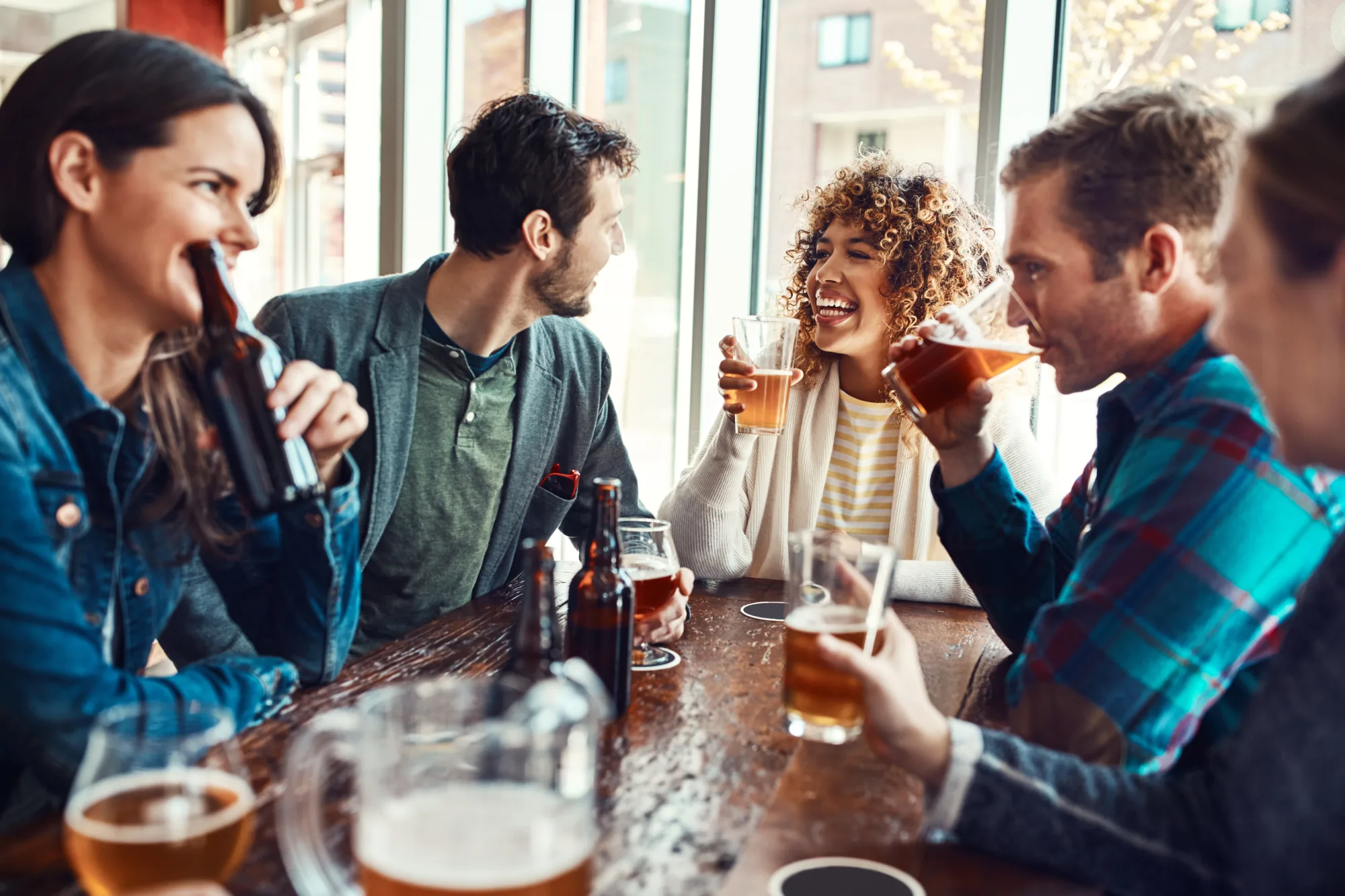Friends spending time together over drinks in Frankfurt