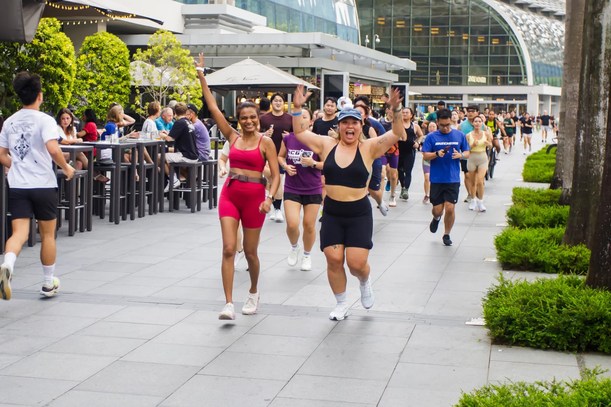 A joyful running community gathering in Singapore