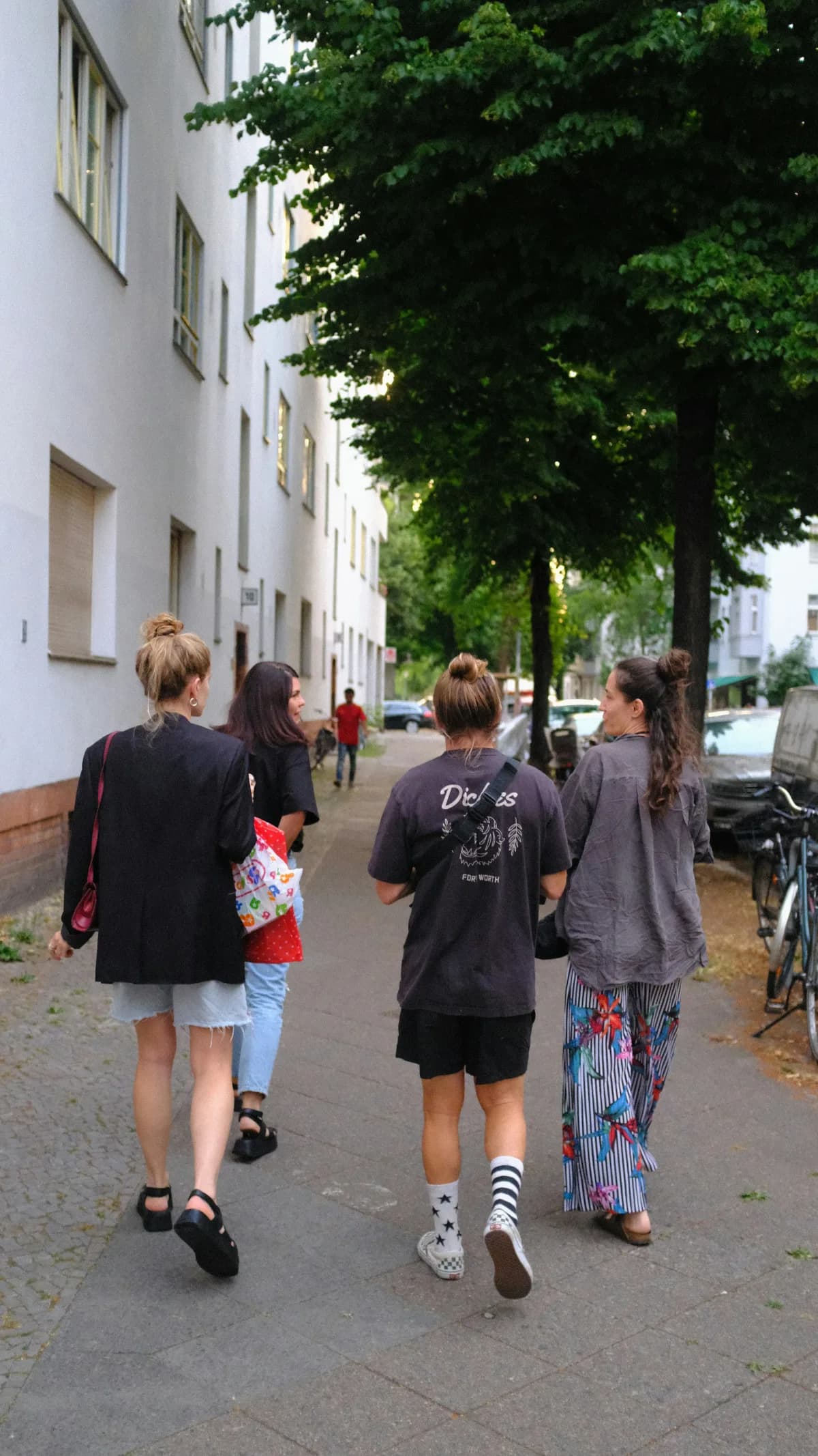 Friends walking through their neighborhood